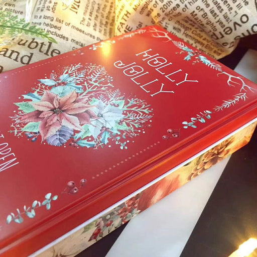 red holly jolly gift tin