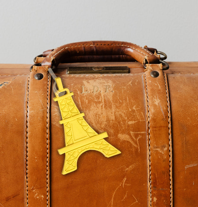yellow eiffel tower luggage tag